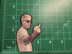 Anthony Bourdain Middle Finger – Laminated Vinyl Sticker – 2″x3″